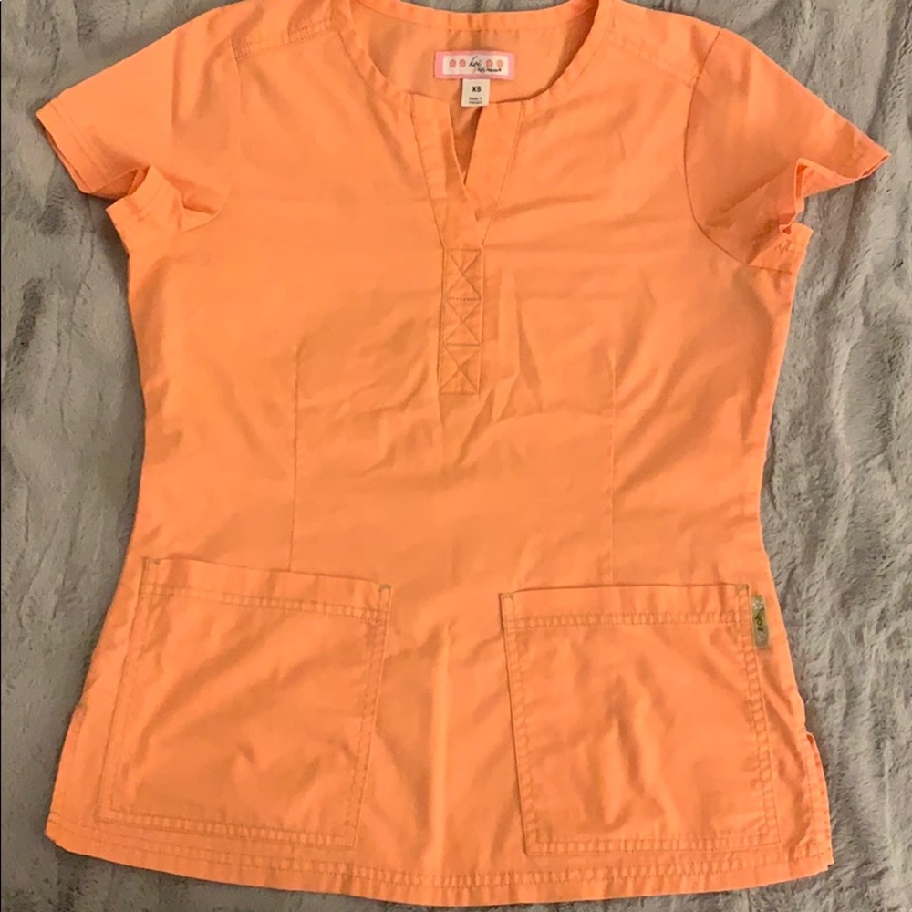 Koi scrub top